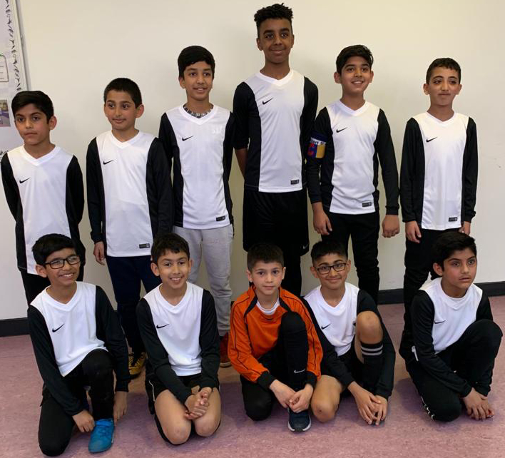 ICCF U12s squad on the pitch